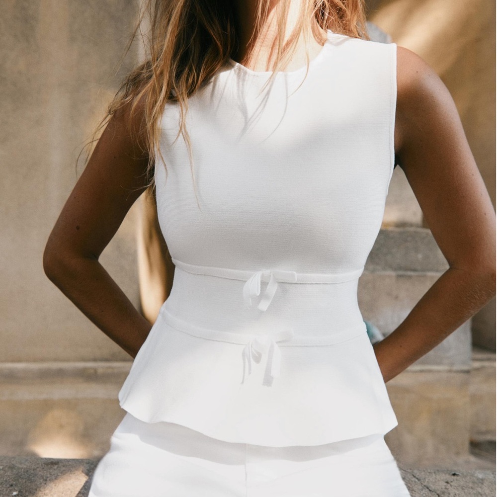Tie-Detail Peplum Knit Top